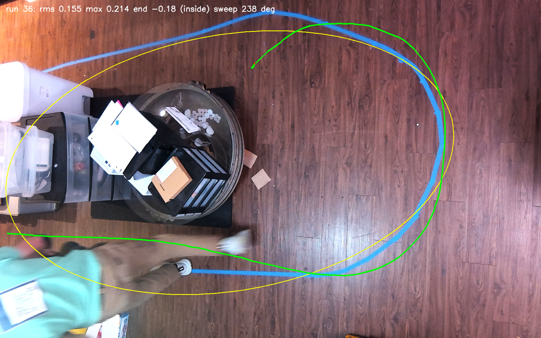 Figure 2. The ceiling camera's view of one graded run: the traced tape, the corridor, and the truck's path through the bend.